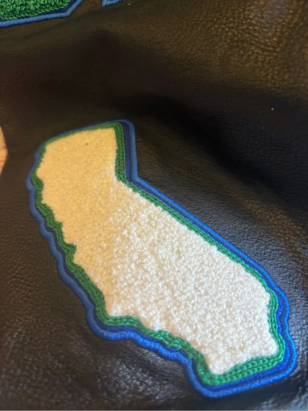 Jordan Black Bomber Jacket with Green Air Jordan Patch